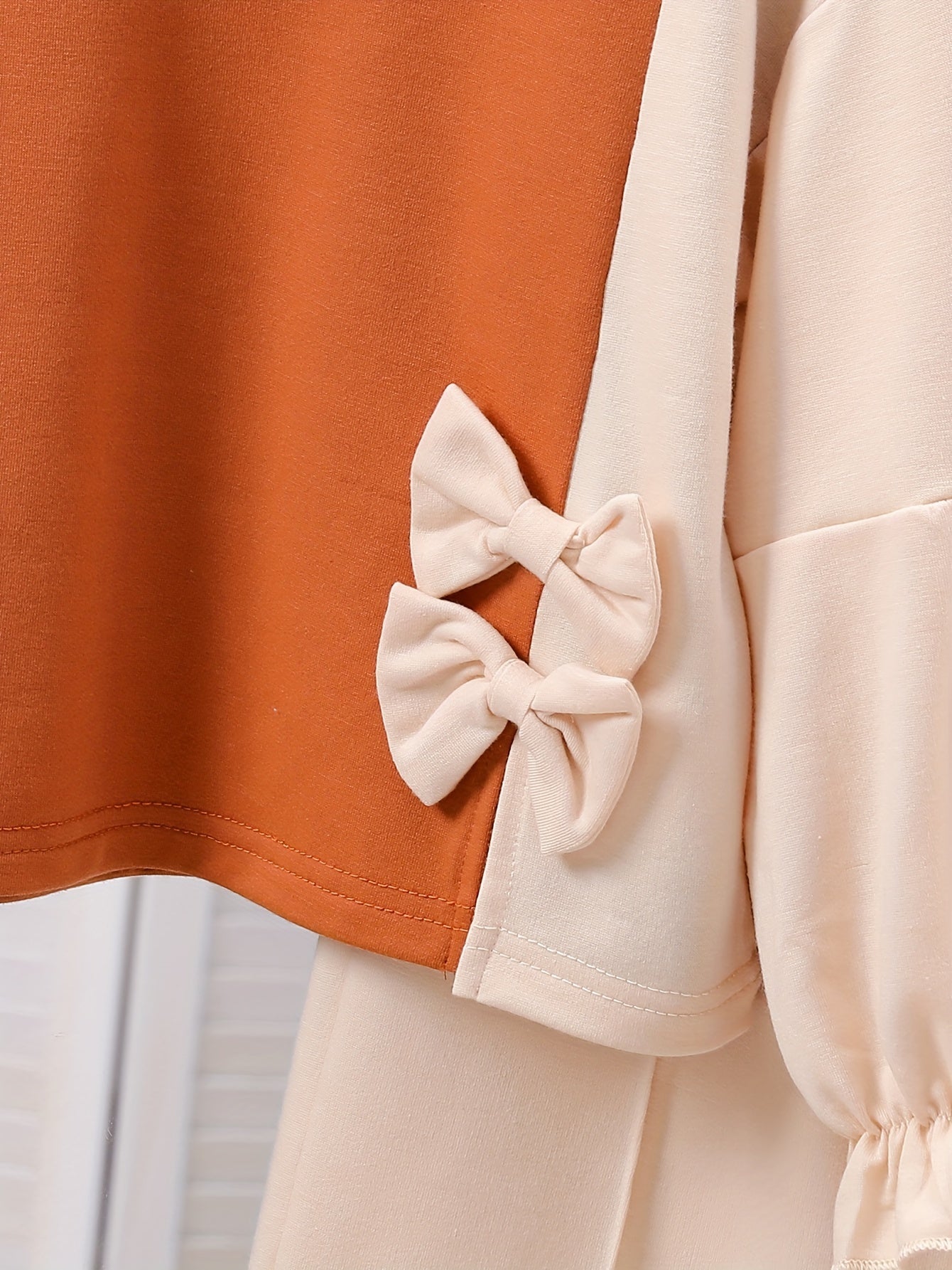 Girls' Spring and Autumn Fashion Two-Piece Set: Two-tone Spliced Long-sleeved Round Neck Bow Top + Slit Leggings with Bow Wide-leg Trousers,